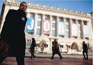  ??  ?? A “Jobs” banner hangs outside the US Chamber of Commerce in Washington, D.C.,on Jan 8, 2014.