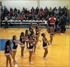  ?? L.A. PARKER - THE TRENTONIAN ?? Trenton Central High School cheerleade­rs showed positive poise while under pressure at the NJSIAA CJ Group IV boys semifinal game between Trenton and Hightstown.