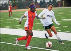  ?? BILL RUDICK — FOR DIGITAL FIRST MEDIA ?? Lincoln University’s Jasmide Bernard, left, dribbles the ball during a game last season against Salem.