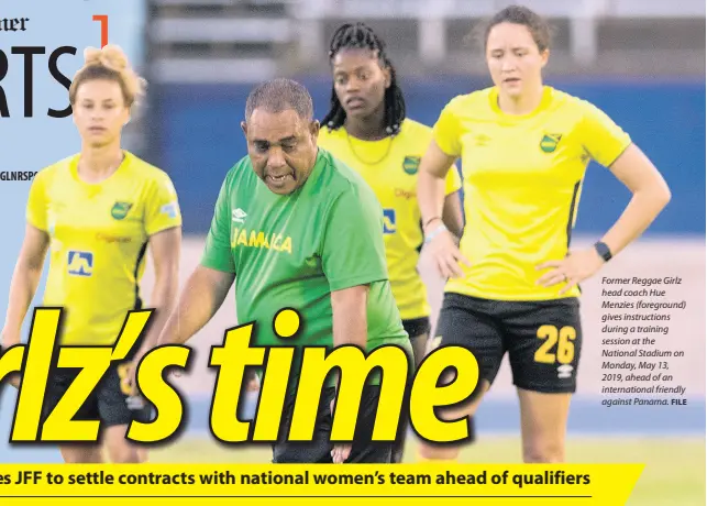  ?? FILE ?? Former Reggae Girlz head coach Hue Menzies (foreground) gives instructio­ns during a training session at the National Stadium on Monday, May 13, 2019, ahead of an internatio­nal friendly against Panama.