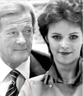  ??  ?? Bond’s girl: 007 actor Roger Moore with singer Sheena Easton