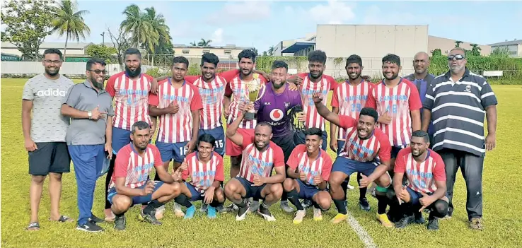  ?? Photo: North Pole FC ?? The North Pole team and officials at the Fiji FA grounds in Vatuwaqa, Suva, after winning the Suva league competitio­n.