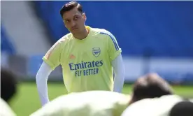 ?? Photograph: Stuart MacFarlane/Arsenal FC/Getty Images ?? Mesut Özil said he will decide when he leaves Arsenal and that he intends to fight for a place in the team.