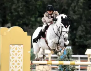  ??  ?? Salmeen Sultan al-Suwaidi in action during the Big Tour event in the sixth leg of the Hathab Equestrian Series at the Qatar Equestrian Federation yesterday.