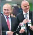  ?? | AP ?? Putin e Infantino recibieron el FAN ID, requisito obligatori­o para ingresar a un estadio durante el Mundial.