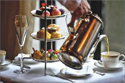  ?? BRENDAN SMIALOWSKI/AFP ?? Galentine’s Day tea is served at the St Regis hotel on Tuesday in Washington, DC.