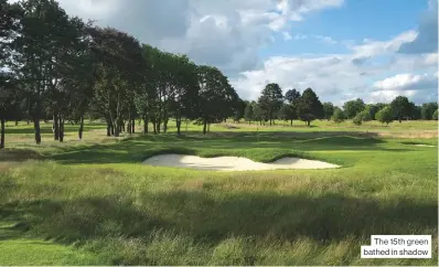  ??  ?? The 15th green bathed in shadow