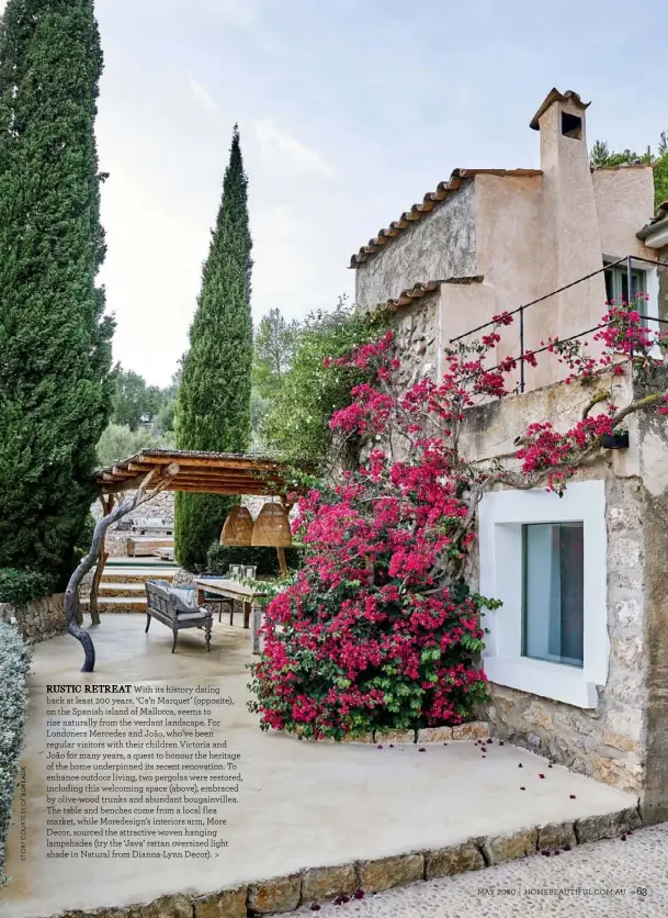  ??  ?? RUSTIC RETREAT With its history dating back at least 200 years, ‘Ca’n Marquet’ (opposite), on the Spanish island of Mallorca, seems to rise naturally from the verdant landscape. For Londoners Mercedes and João, who’ve been regular visitors with their children Victoria and João for many years, a quest to honour the heritage of the home underpinne­d its recent renovation. To enhance outdoor living, two pergolas were restored, including this welcoming space (above), embraced by olive-wood trunks and abundant bougainvil­lea. The table and benches come from a local flea market, while Moredesign’s interiors arm, More Decor, sourced the attractive woven hanging lampshades (try the ‘Java’ rattan oversized light shade in Natural from Dianna-Lynn Decor). >