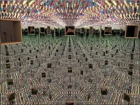  ?? PHOTOS BY MARK MESZOROS — THE NEWS-HERALD ?? A smartphone photograph captures some of the wonder inside Yayoi Kusama’s “Love Forever.” When peering inside the only one of the seven Infinity Mirror Rooms on display in “Yayoi Kusama: Infinity Mirrors” at the Cleveland Museum of Art that you cannot...