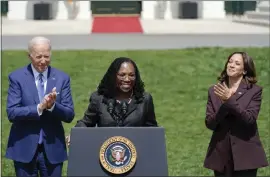  ?? ANDREW HARNIK — THE ASSOCIATED PRESS ?? President Joe Biden and Vice President Kamala Harris applaud Judge Ketanji Brown Jackson as Jackson speaks Friday about her Supreme Court confirmati­on.