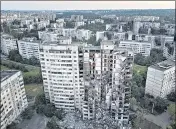  ?? AP ?? An apartment building damaged by Russian attack is seen in Kharkiv, Ukraine.