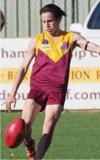  ??  ?? Drouin Under 18 player Owen Walsh gives his kick full concentrat­ion as the Hawks battled it out against Traralgon on Saturday.