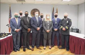  ?? City of Troy ?? The Troy Police Department swore in new officers at a City Hall ceremony on Feb. 12. From left are Mayor Patrick Madden, Chief Brian Owens, new officers David Grant and Jack Engster, Assistant Chief Chris Kehn, new officers Katherine Molesky and Kevin Koberger and Deputy Chief Dan Dewolf.