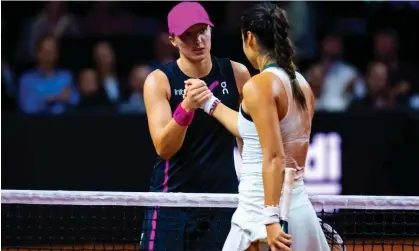  ?? Robert Prange/Getty Images ?? Emma Raducanu shakes hands with Iga Swiatek after a promising performanc­e against the world No1 at the Stuttgart Open. Photograph: