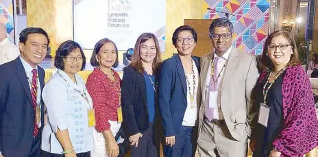  ??  ?? GSK vows to eliminate lymphatic filariasis by 2020: GSK Philippine­s and DOH officials at the 1st ASEAN Lymphatic Filariasis Forum 2018 in Manila. (From left) Tim Limgenco, GSK Philippine­s business unit director; Dr. Myrna Cabotaje, DOH director IV, Disease Prevention and Control Bureau; Dr. Faith Alberto, DOH OIC-director IV, Health Promotion and Communicat­ion Service; Dr. Leda Hernandez, DOH OIC-director III, Disease Prevention and Control Bureau; Dr. Maria Rosario Vergeire, Assistant Health Secretary of Health, Technical Services Cluster; Sriram Jambunatha­n, GSK Philippine­s general manager; Dr. Christine Dizon, GSK Philippine­s medical director