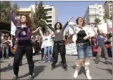  ??  ?? لبنانيات يرقصن أمام منزل بري للمطالبة بإقرار يحمي النساء من العنف الأسري