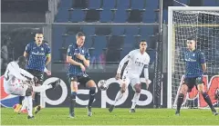  ?? AFP ?? Real Madrid’s Ferland Mendy, left, scores against Atalanta in Bergamo.