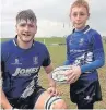  ??  ?? ●● The Blues’ mascot on Saturday was Under-10 player Joseph Moorcroft (pictured with captain Mike Finnemore)