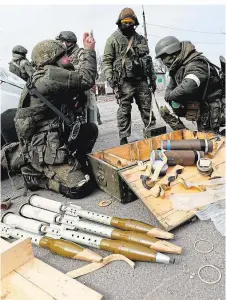  ?? ?? Russische Einheiten mit Granatwerf­er-Munition in Mariupol