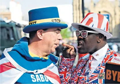  ??  ?? Leave and Remain protesters face off at a demonstrat­ion in London earlier this year. The City is similarly divided on what kind of Brexit to lobby for, with large banks now bypassng the tradtional lobby groups to communicat­e their concerns directly with the Treasury