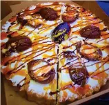  ??  ?? Fancy a slice? The Creme Egg pizza