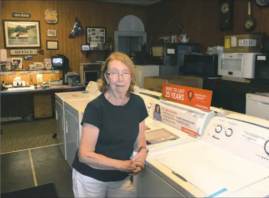  ?? Nate Guidry/Post-Gazette ?? Virginia Vinski-Fischer owns Vinski Brothers appliances in Etna with her husband, John Fischer. The business has been in her family for 70 years. “We’ve had some of the same customers for 50 years,” she said.