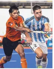  ??  ?? Fighter: Striker Norsyafiq Sumantri (left) wants to prove his worth when donning the national jersey in the forthcomin­g hockey World Cup in India.