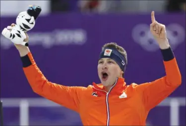  ?? JOHN LOCHER — ASSOCIATED PRESS ?? Gold medalist Sven Kramer of The Netherland­s celebrates after the men’s 5,000 meters race on Feb. 11 at the Gangneung Oval at the Winter Olympics.