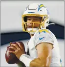  ?? JUSTIN EDMONDS — THE ASSOCIATED PRESS ?? Chargers quarterbac­k Justin Herbert has played well but Los Angeles is only 1-5 with him as the starter.