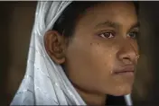  ?? ?? Nureja Khatun, 19, cries as she waits in her shanty home in the Morigaon district of the Indian northeaste­rn state of Assam on Feb. 11. Khatun's husband, Akbor Ali, is one among more than 3,000 men, including Hindu and Muslim priests, who were arrested nearly two weeks ago in the northeaste­rn state of Assam under a wide crackdown on illegal child marriages involving girls under the age of 18.