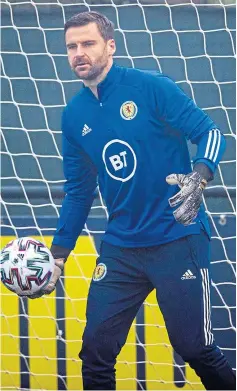  ??  ?? MR ASSURED: David Marshall is now a Scotland legend.