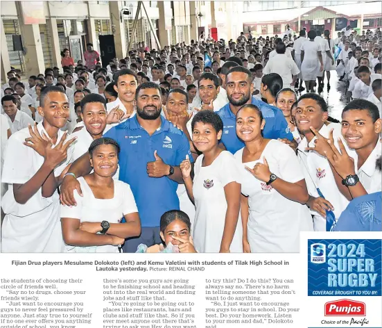  ?? Picture: REINAL CHAND ?? Fijian Drua players Mesulame Dolokoto (left) and Kemu Valetini with students of Tilak High School in Lautoka yesterday.