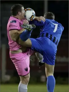  ??  ?? Seán Kelly clashes with Josh Hogan of Athlone Town.