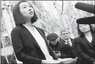  ?? AP File Photo ?? Mariko Hirose a litigation director at the Urban Justice Center, addresses reporters Dec. 21 in front of a federal courthouse in Seattle.