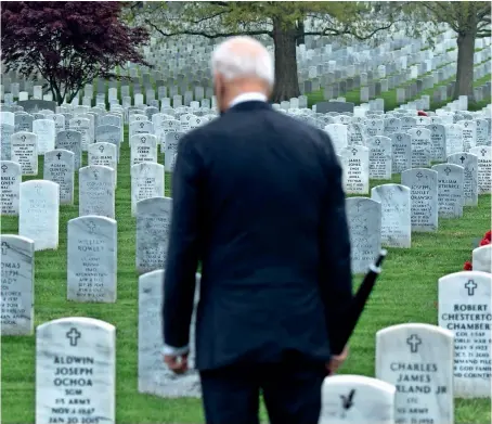  ?? AFP ?? US President Joe Biden walks through Arlington National cemetery to honour fallen veterans of the Afghan conflict in Arlington, Virginia. —