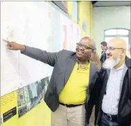  ?? PICTURE: JACQUES NAUDE ?? VISION: eThekwini Deputy City Manager for economic developmen­t and planning, Musa Mbhele discusses plans for the Warwick Avenue precinct with eThekwini’s iTrump senior manager, Hoosen Moolla.