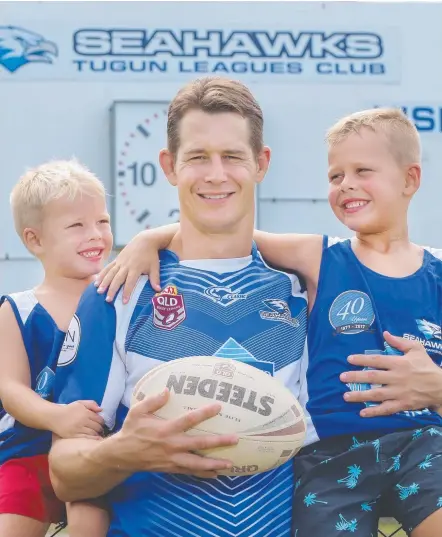  ?? Picture: GLENN HAMPSON ?? Former Titans veteran Ashley Harrison, who will play for Tugun in 2018, with sons Will, 4, and Ethan, 6.