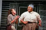  ??  ?? Isake Akanke and Candy McLellan play the slave girls Dido and Minnie in Branden Jacobs-Jenkins’ “An Octoroon” at Actor’s Express.