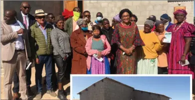  ?? Photos: Nampa ?? Together… Deputy minister of Urban and Rural Developmen­t Natalia /Goagoses with some of the owners of 70 Build Together houses in Swakopmund.