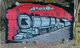 ??  ?? This tribute to Bourne’s steam age appeared overnight on the underside of one of the arches of the demolition-threatened Bridge 234. ROBIN JONES