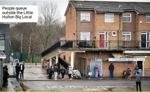  ??  ?? People queue outside the Little Hulton Big Local