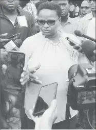  ??  ?? Volda Lawrence speaking with reporters yesterday