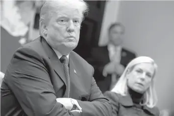  ?? AGENCE FRANCE PRESSE ?? US President Donald Trump listens with US Secretary of Homeland Security Kirstjen Nielsen during a meeting with Republican members of the Senate about immigratio­n at the White House in Washington, DC.