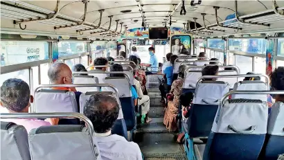  ??  ?? File picture of passengers in a bus in Hambantota during the easing of the lockdown.