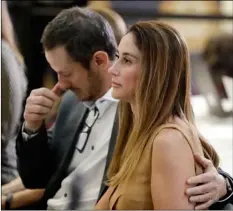  ?? AP PhOTO/ChRIS CARLSON ?? Jeanne Bernstein (right) and her husband Gideon parents of murder victim Blaze Bernstein, listen during a news conference on Thursday, in Santa Ana.