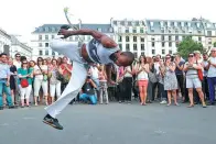  ?? AFP ?? A dancer performs capoeira during a Brazilian cultural festival in September in Paris, France.