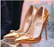  ?? Picture: AFP ?? The Jada Dubai diamond shoes, worth $17m, on display in Dubai.