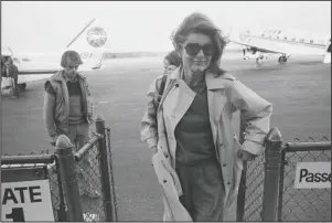  ?? The Associate Press ?? ESTATE SOLD: In this Nov. 21, 1983 file photo Jacqueline Kennedy Onassis arrives at the Barnstable Airport, in Hyannis, Mass., to observe the 20th anniversar­y of the assassinat­ion of President John F. Kennedy. The Martha’s Vineyard estate of the former first lady is being sold to a pair of nonprofits that plan on turning the property into conservati­on land open to the public, officials said Thursday.