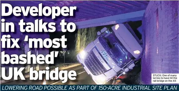  ??  ?? STUCK: One of many lorries to have hit the rail bridge on the A5