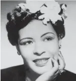  ?? MICHAEL OCHS ARCHIVES ?? Jazz singer Billie Holiday poses for a portrait circa 1939 with a flower in her hair.